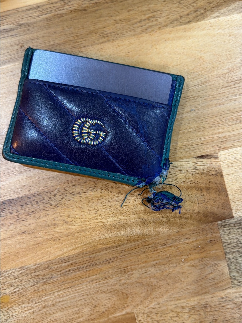 Gucci Navy Leather Card Holder with Green Trim and Gold Emblem (damaged).